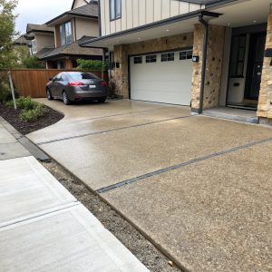 Polished concrete driveway entrance at a Wanniassa property