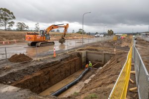 Foundation excavation site in wet weather conditions